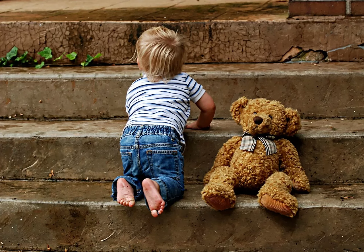 Vaccine and Child on Stairs